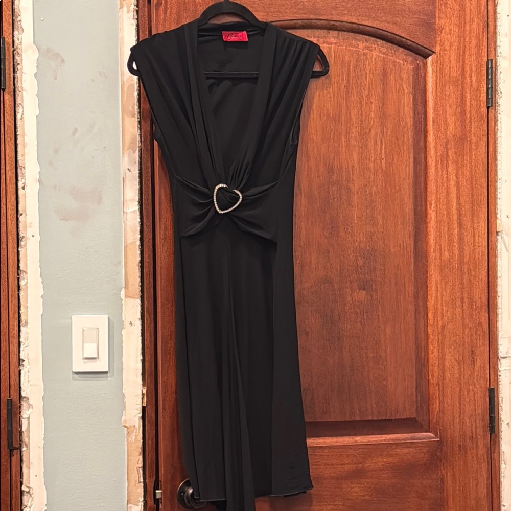 Elegant Black Dress with Heart Detail